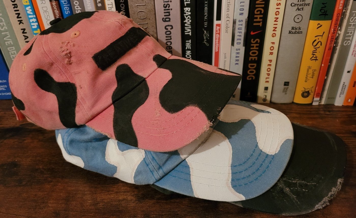 Painted caps, The three