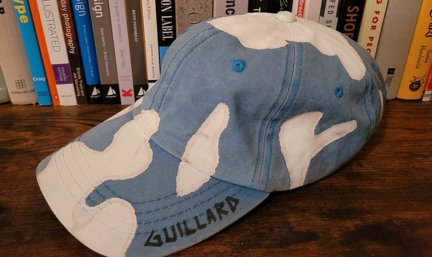 Painted caps, White on blue